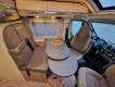 Malibu-Van-First-Class-Two-Rooms-GT-SkyViews-640-LE-RB-camper-dinette.jpg
