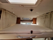 Elnagh-T-Loft-45-camper-letto-basculante-sopra-dinette.jpg