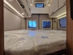 Weinsberg-Carabus-600-MQH-Edition-Fire-camper-letto-matrimoniale-posteriore.jpg